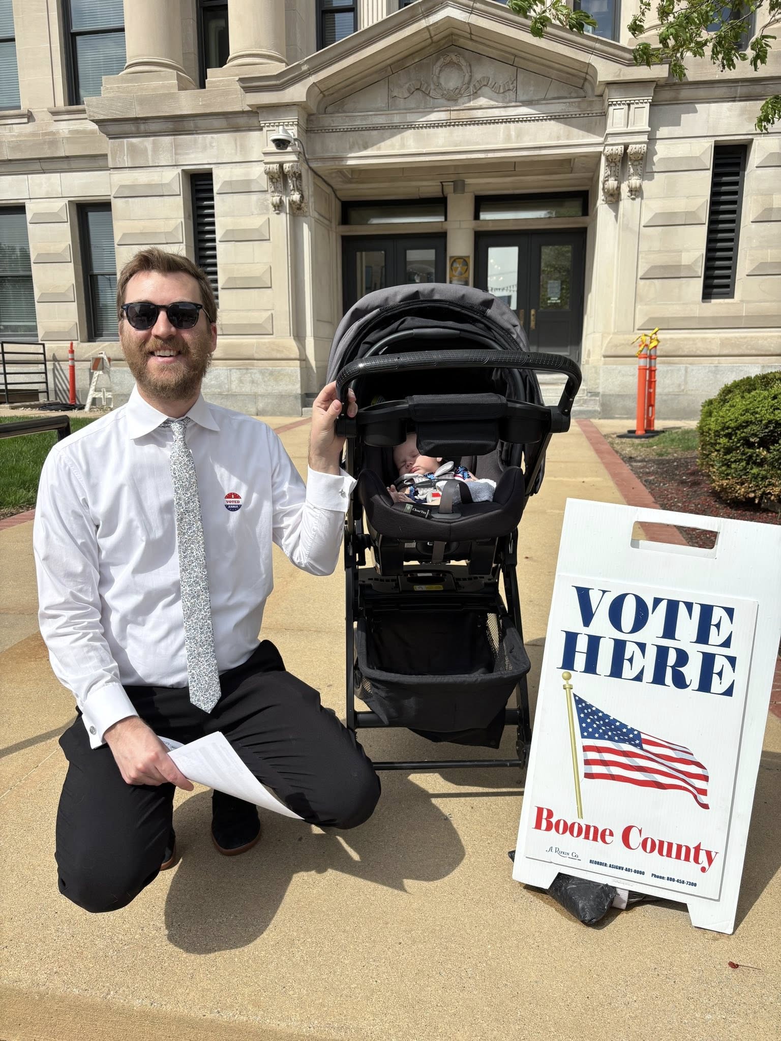 Geoff Lee at the Boone County Courthouse with his daughter on Election Day